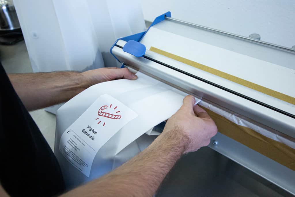 Packing coffee bags.